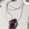 Collier en micro-macramé violet en améthyste et cristal de roche.